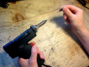 cleaning the gun of the desoldering station